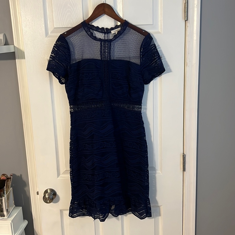 Francesca’s navy blue dress with sheer details